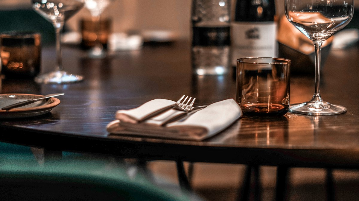 Restaurant dining setting illustrating local operating and menu pricing factors